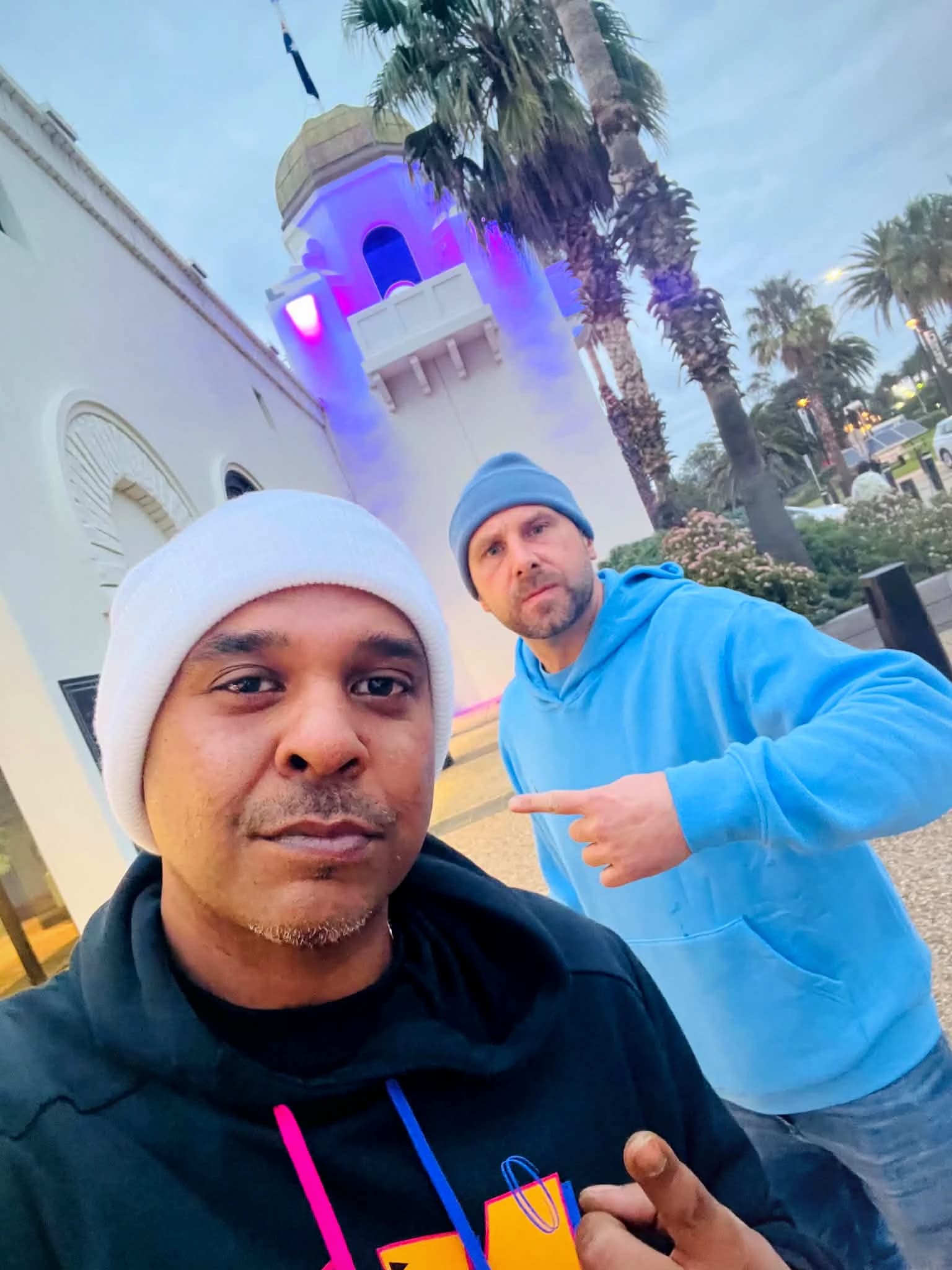 Dash and Wiz at dusk outside St Kilda Sea Baths in Melbourne